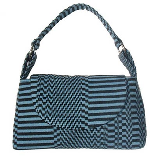 Illustration for article titled Kim White Creates Handbags From Vintage Automotive Interior Fabric